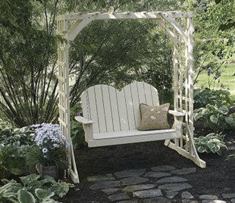 Garden swith attached to wooden arbor