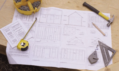 Using a set of plans to build a wood shed.