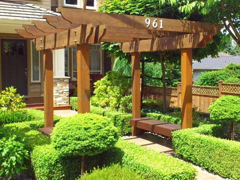 Custom built wood pergola with benches