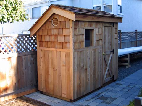 A small garden shed can be very handy for storing garden tools and outdoor toys